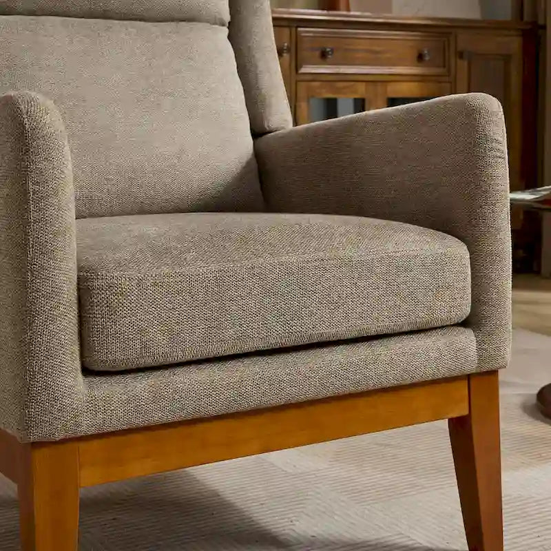 Fauteuil rembourré à dossier haut